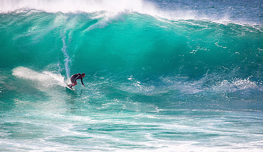 person doing surfing during daytime thumbnail