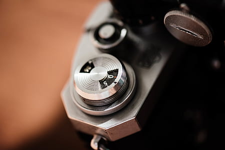 selective focus photography of gray and black camera thumbnail
