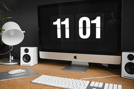 silver iMac on top of desk thumbnail