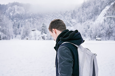 Man in the Middle of Snowy Valley thumbnail