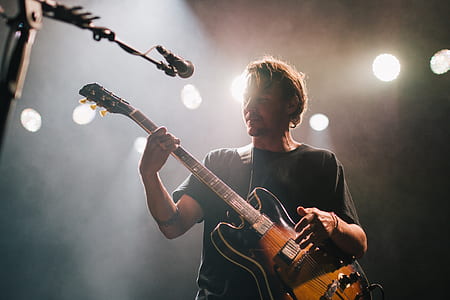 man playing guitar thumbnail