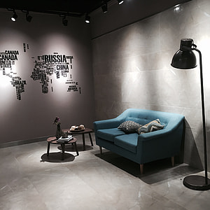turned-on floor lamp near sofa thumbnail