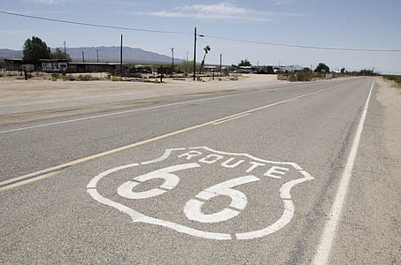 route 66 sign on asphalt floor thumbnail