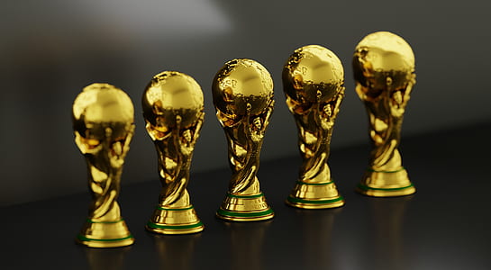 five gold-colored trophies thumbnail