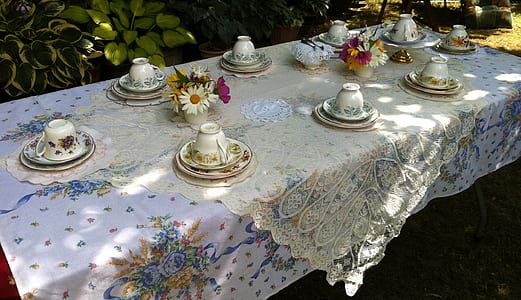 white teacup with saucer place on table thumbnail