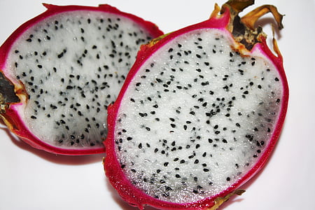 sliced dragon fruit on white surface thumbnail