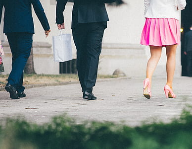 woman walking beside street thumbnail