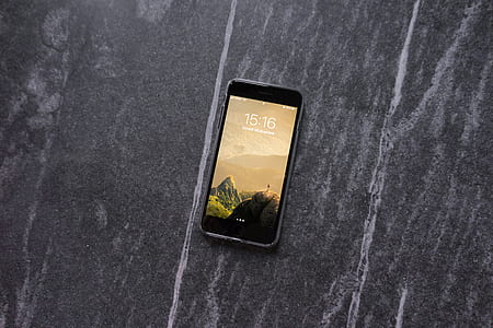 post 2017 iPhone on grey surface thumbnail