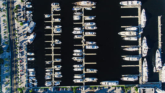 aerial view photography of ships near docks thumbnail
