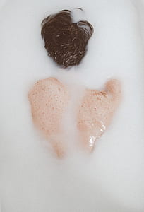 person bathing on milk thumbnail