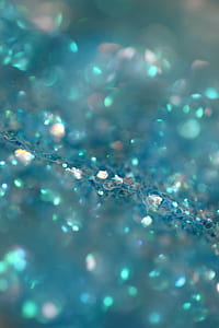 selective photo of blue glitters thumbnail