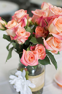 bouquet of pink roses in glass vase thumbnail
