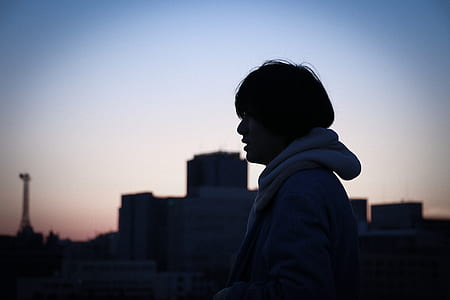 man wearing hoodie during sunset thumbnail