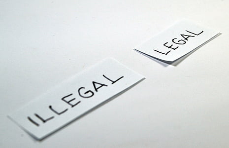 white paper with illegal and legal text thumbnail
