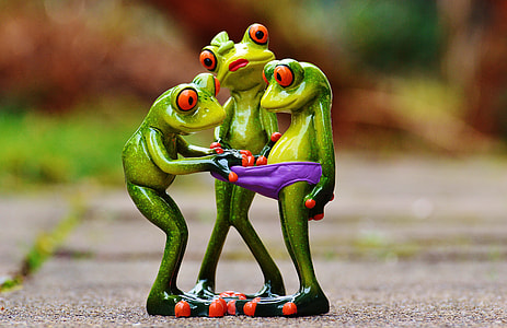 selective focus photography of three wise frogs figurine thumbnail
