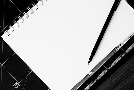 white notebook and black ballpoint pen thumbnail