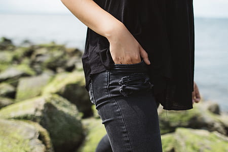 person inserting hand on his/her pocket thumbnail
