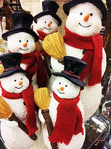 five snowman figurines on glass-top surface thumbnail