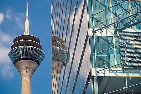 glass building near tower thumbnail
