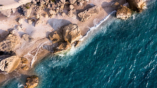 waves crashing on seashore thumbnail