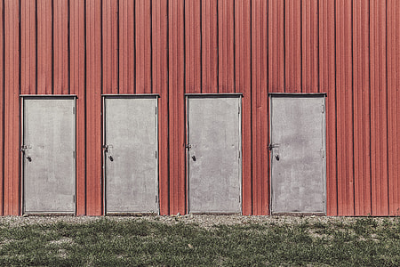 four gray metal doors thumbnail