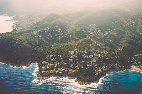 aerial photo of town near sea thumbnail
