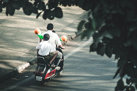 man with his children on a motorcycle thumbnail