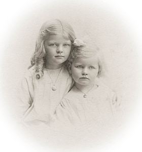 grayscale photo of two girls thumbnail