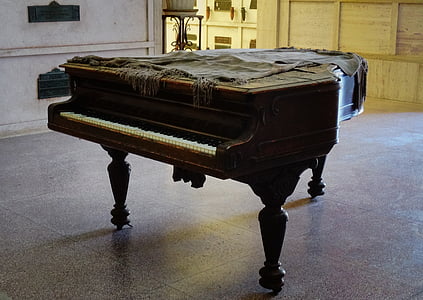 brown wooden grand piano thumbnail