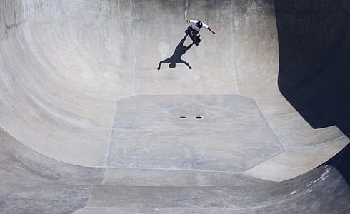 person skateboarding on concrete pavement thumbnail