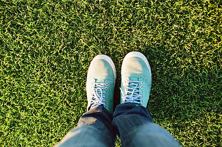 person wearing teal low-top sneakers thumbnail