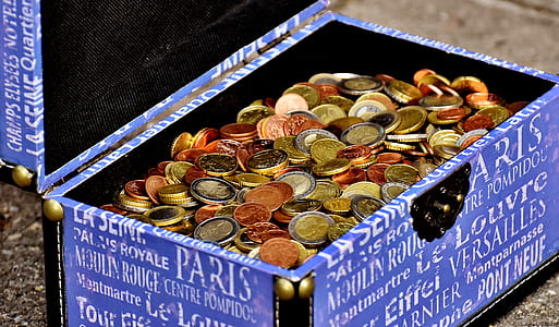assorted coins in blue box thumbnail