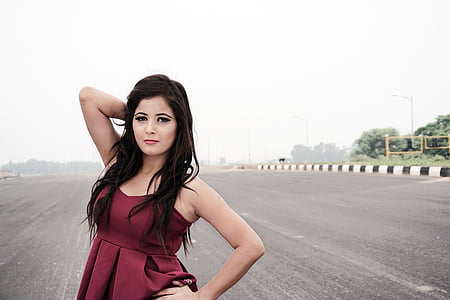 woman wearing purple spaghetti strap top thumbnail