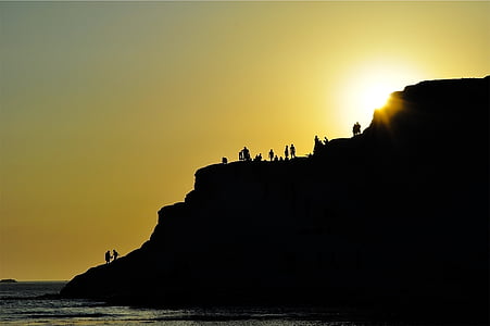 silhouette photo of people at mountain thumbnail