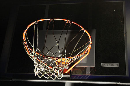 selective focus photography of orange basketball hoop thumbnail