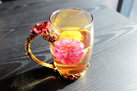 clear glass mug on brown wooden surface thumbnail