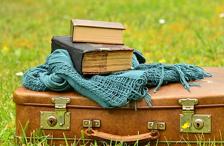 book and teal scarf on the briefcase thumbnail