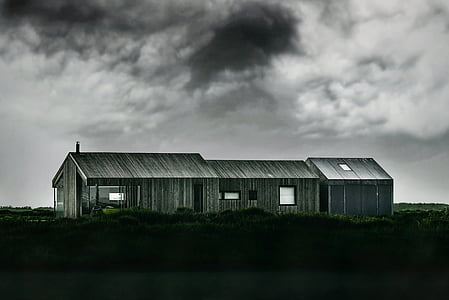 gray house surrounded with grass thumbnail