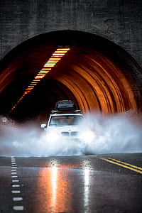 white BMW SUV on road thumbnail