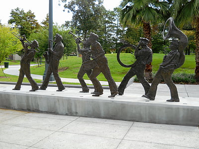 statue standing sidewalk thumbnail