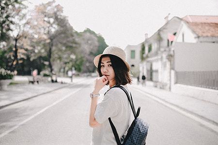 woman with black leather backpack thumbnail