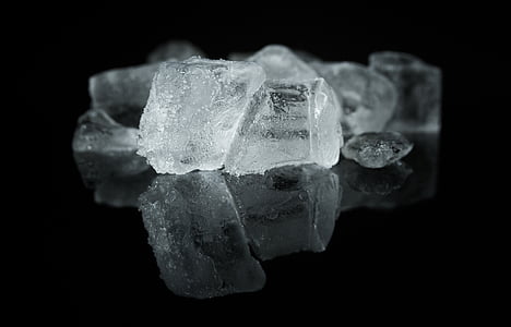 clear stone on black surface thumbnail