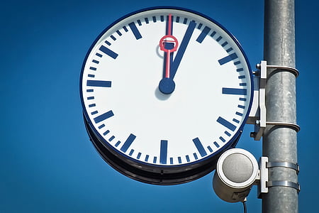 round white and blue analog wall clock thumbnail