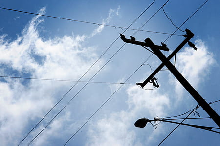 low angle photography of utility post thumbnail
