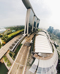 high-angle photography of gray buildings near trees thumbnail