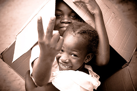 two children inside box thumbnail