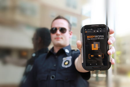 man holding smartphone thumbnail
