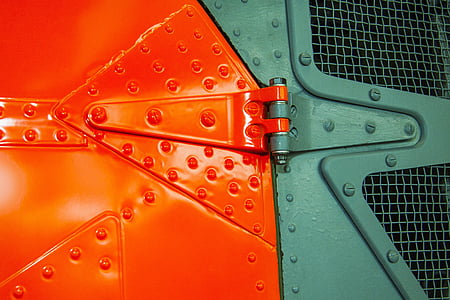 closed green and orange door thumbnail