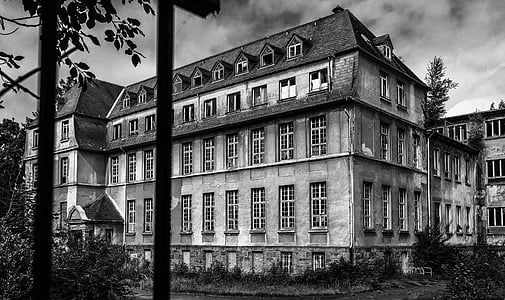 gray scale photo of white concrete house thumbnail