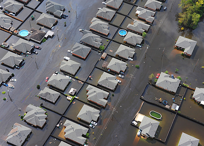 aerial view photography of houses surrounded by water thumbnail